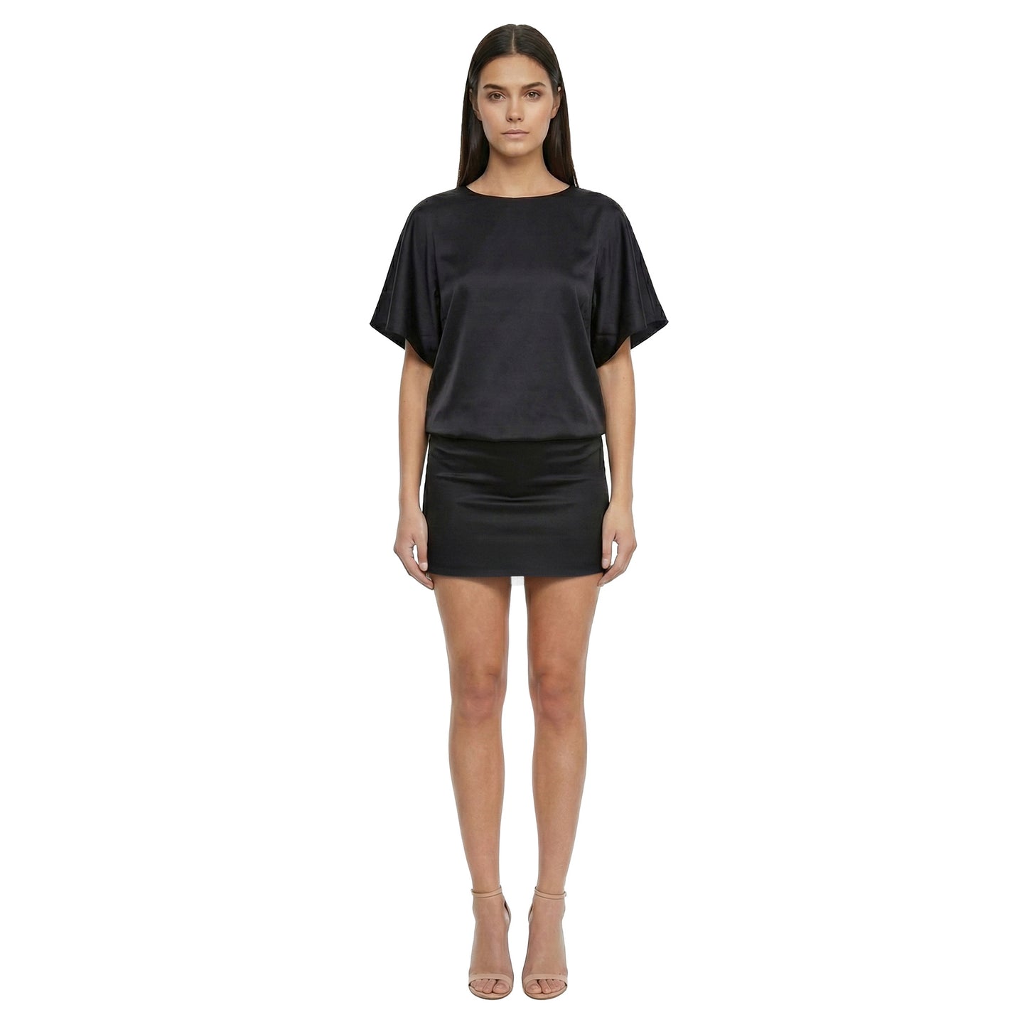 Woman wearing a black outfit on a white background