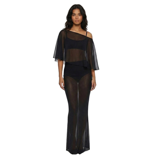 Woman wearing a black sheer outfit on a white background